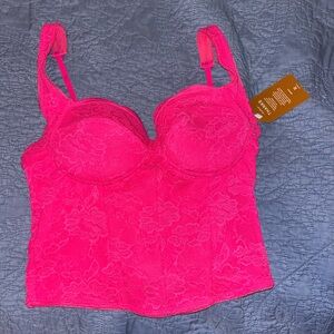 Pink corset like top, size large, brand is Reoria.